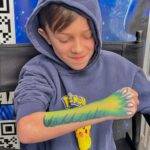 Face Painting Add-On – Safe, Fun & Colorful for Every Party! 25 Rolling Video Games Long Island face painting claw design at school party