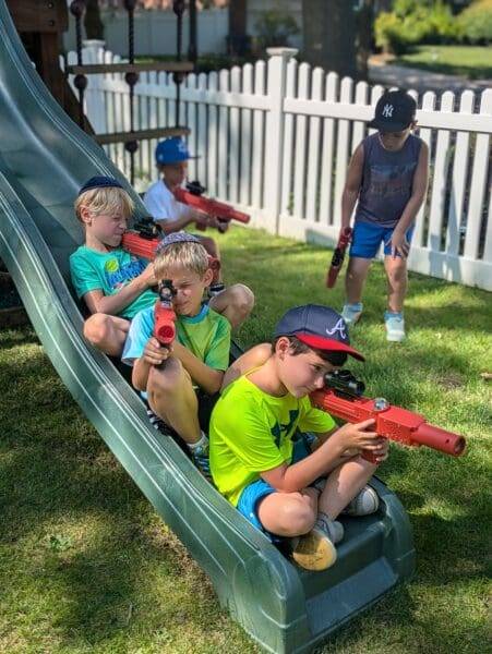 Kids camping on a slide playing LT in West Islip, NY